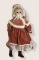 Porcelain Doll in Velvet Outfit