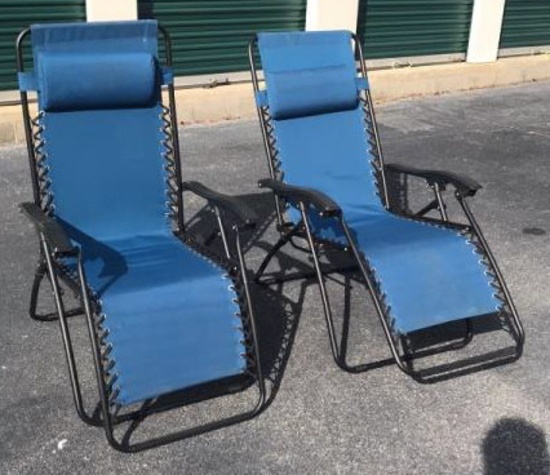 (2) polyester outdoor lounge chairs