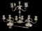 (3) Silverplate Candelabras and (1) Candle