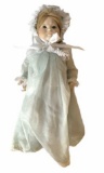 Doll-all porcelain with movable arm and legs,