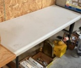 5' White Plastic Folding Table - Stock Photo