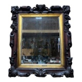 Beveled Mirror In Ornately Carved Wood Frame -