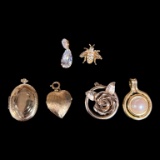 (6) Gold Toned Pendants Including (2) Lockets