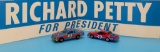 (2) Vintage Ertl Richard Petty Toy Cars and (1)