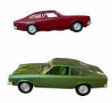 (2) Vega Promo Cars:  1977 Medium Red and 1976