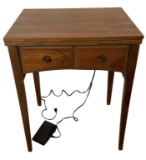 Singer Sewing Machine in Wooden Cabinet