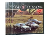 (7) 1984 Oldsmobile Brochures