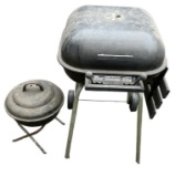 (2) Grills: Meco Swinger II Smoker Grill and