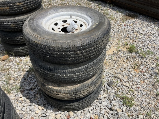 4 USED TRAILER TIRES AND RIMS