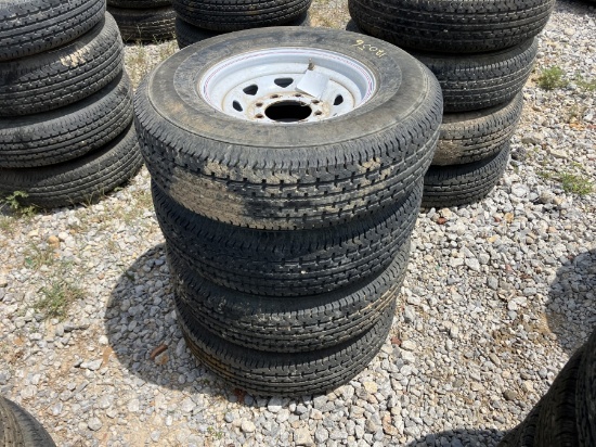 4 USED TRAILER TIRES AND RIMS