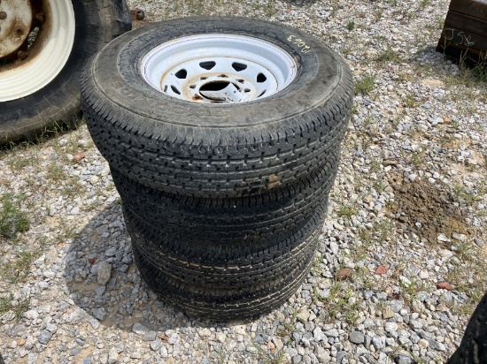 4 USED TRAILER TIRES AND RIMS