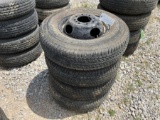 4 USED TRAILER TIRES AND RIMS