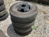 4 USED TRAILER TIRES AND RIMS