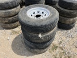 4 USED TRAILER TIRES AND RIMS