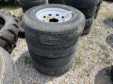 4 USED TRAILER TIRES AND RIMS