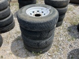 4 USED TRAILER TIRES AND RIMS