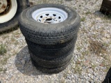 4 USED TRAILER TIRES AND RIMS