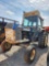 LONG MODEL 910-2 CAB TRACTOR, 4 CYLINDER DIESEL ENGINE, RUNS & DRIVES NEEDS HEAD GASKET (AS IS)