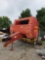 NEW HOLLAND MODEL 678 ROUND BALER W/ BALE RAMP, AUTO-WRAP, TWINE TIE