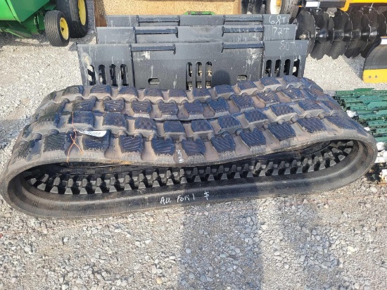 SET OF SKID STEER LOADER TRACKS UNUSED (FITS CAT 259) 1 MONEY