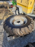GOODYEAR 14.9-28 AG TIRE W/ 8 LUG RIM