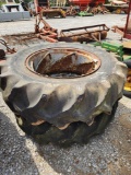 2- GOODYEAR 18.4-34 TIRES W/ SPIN OUT RIMS (RIMS ARE GOOD)