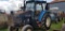 NEW HOLLAND TS110 TRACTOR W/LOGGER SPECIALS