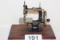 Antique Singer Sewing Machine On Wood 10
