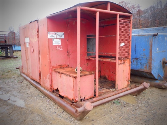 10'x6'6" Dog House, mounted on 18' oilfield skid base. In fair condition.