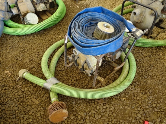 (GP-460) HONDA 2" Gas Powered Trash Pump and Hose. In good condition.