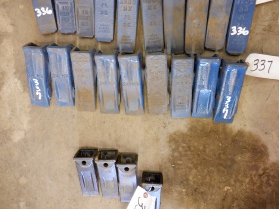 (9) UNUSED Bucket Teeth and (3) Shanks