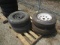 (2) 215/75B15 Tires, (1) H78-15ST Tire, and (1) 9.50-16.5 Tire, all with rims