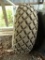 (2) 18.4-26 Tires, (1) with rim
