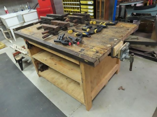 43" x 60" Wood Work Table, vise and assorted parallel clamps and quick grip clamps (Clearfield) (GJ