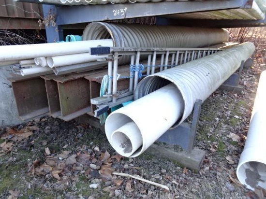 Steel Beams and Pipe on Bottom Rack