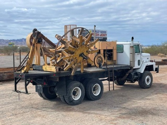 Single Drum Rewind Machine, powered by Cummins 5.9L diesel engine and automatic transmission,