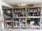 (7) Metal Racks and Contents Including: automotive fluids, filters, lubricants, spray paint wire,