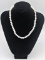 FreshWater Cultured White 6-6.4mm Pearl Necklace 1 The classic pearl strand features nearly round fr