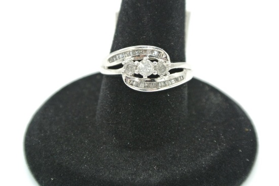 1/2 ctw with round & baguette diamonds ring Ladies 1/2 Carat Total Diamond Weight Ring W/ 3 Round Di