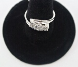 10K white gold ring with diamond accents 10K White gold using ring with diamond accents. Original Re