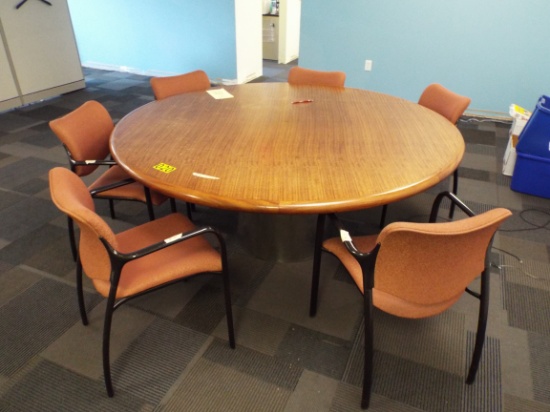 Round conference table with 6 chairs.