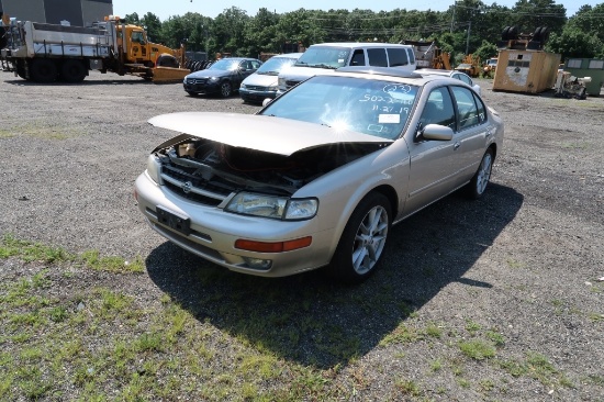 98 Nissan Maxima  4DSD GL 6 cyl  Rebuild Title AT PB PS R AC PW VIN: NY75293; Defects: Body Damage; 