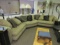 Three-piece black and gray sectional with pillows