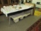 Ebony glass top table with metal legs, 73