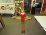 Articulated wooden Pinocchio, height 60