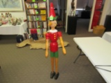 Articulated wooden Pinocchio, height 60