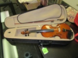 Violin in case marked Palatino