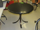 Single pedestal marble top table with iron legs, 36