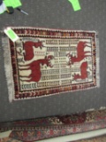 Persian rug with stags, 48
