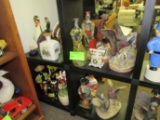 Four shelves of decanters